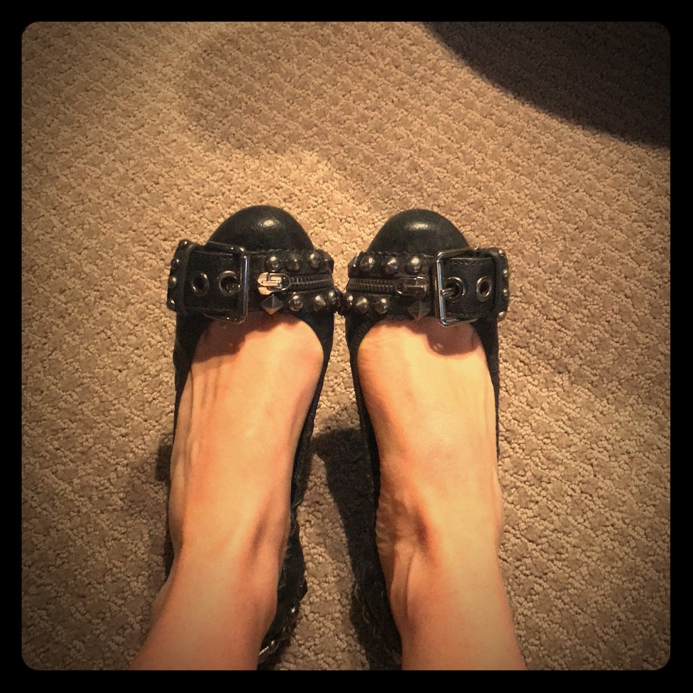 Foldable Miu Miu black flats.
